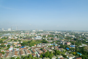 Aerial view of the roof of a house with a car taken by a drone, top view of road