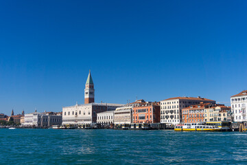 Fototapeta na wymiar Venice from the water under a clear blue sky