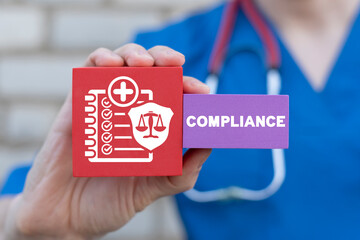Concept of Medicine Pharmacy Quality Control Standards Compliance. Doctor holding styrofoam blocks...