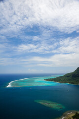View of aqua colored reef encircling Moorea, French Polynesia