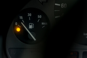 Empty fuel warning light in car dashboard. Fuel pump icon. gasoline gauge dash board in car with...