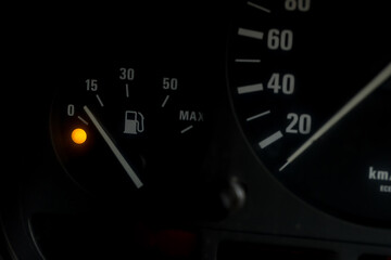 Empty fuel warning light in car dashboard. Fuel pump icon. gasoline gauge dash board in car with...