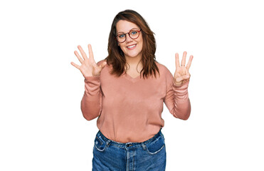 Young plus size woman wearing casual clothes and glasses showing and pointing up with fingers number eight while smiling confident and happy.