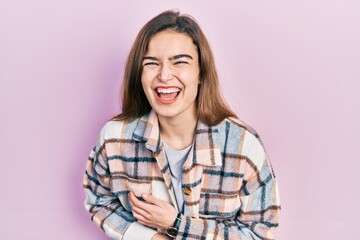 Young caucasian girl wearing casual clothes smiling and laughing hard out loud because funny crazy...