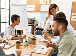 Group of business workers listening boss conference during meeting at the office.