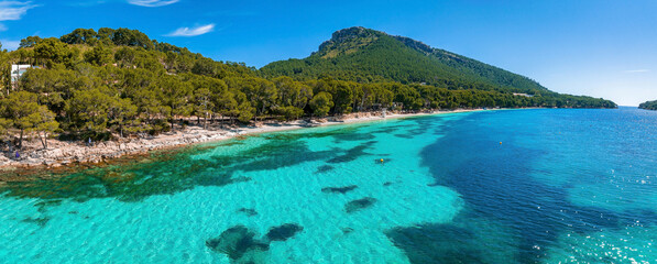 Tropical paradise beach with white sand and coco palms travel tourism wide panorama background...