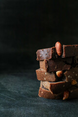 Homemade banana bread with walnut on dark background. Place for text, copy space.