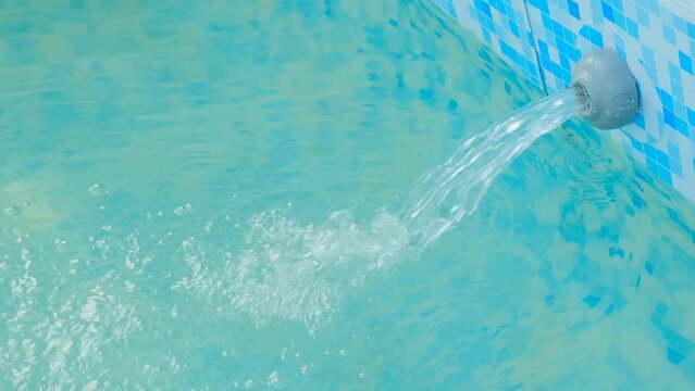 Pool water filtration.slow motion. Swimming pool Filter.Blue water filter.Swimming pool cleaning. 4k footage