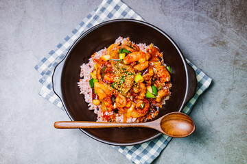 Nakjideopbap, Korean style spicy stir-fried octopus over rice : This dish is made by stir-frying...