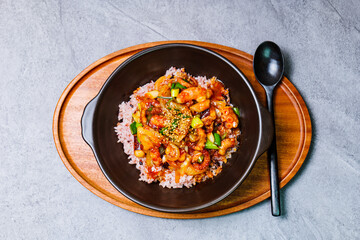 Nakjideopbap, Korean style spicy stir-fried octopus over rice : This dish is made by stir-frying...