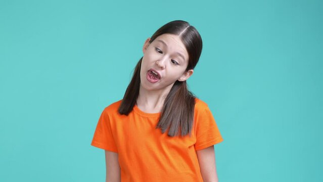 Schoolkid make different faces isolated cyan color background