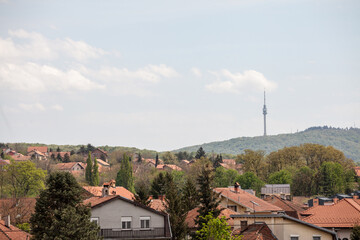 Panorama of Resnik district, a suburban residential area , with Avala toranj tower in background, with individual residential houses. Resnik is a district of Belgrade in Rakovica municipality... © Jerome