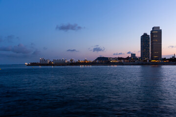 Fototapeta premium Picturesque evening view of Barcelona from Mediterranean sea, Spain