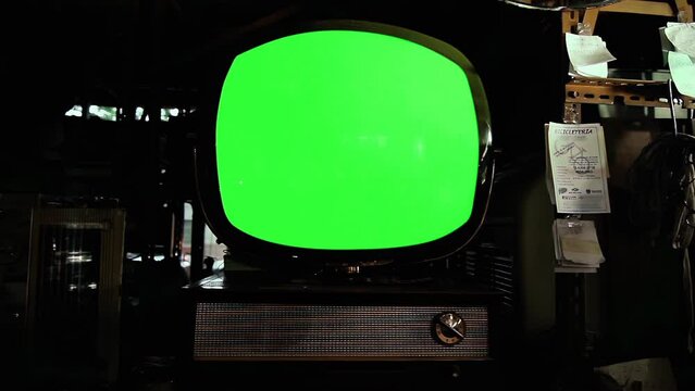 Retro TV Green Screen. Close-Up. Zoom Out. You can replace green screen with the footage or picture you want. You can do it with “Keying” effect in After Effects. 4K Resolution.