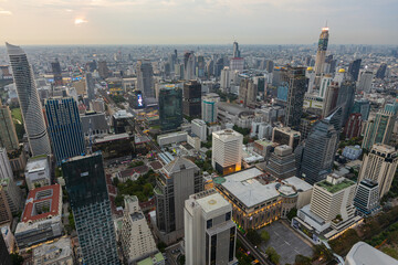 Aerial view of Ploenchit junction with cars traffic skyscraper buildings. Bangkok City in downtown...