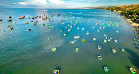 Mui Ne fishing village seen from above with hundreds of boats anchored to avoid storms, this is a...