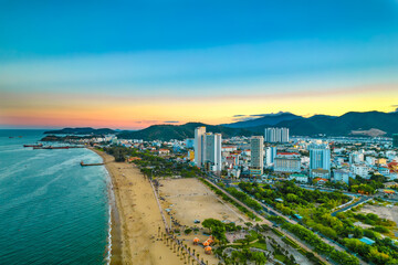 The coastal city of Nha Trang seen from above in the afternoon with its beautiful city and clean...