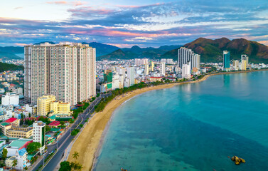 The coastal city of Nha Trang seen from above in the afternoon with its beautiful city and clean sandy beach attracts tourists to visit in Nha Trang, Vietnam