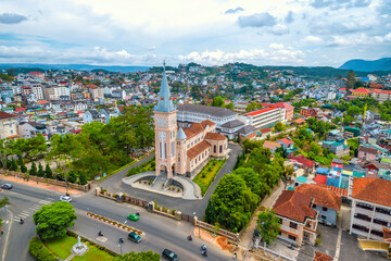 Obraz premium Aerial view outside Cathedral chicken on a morning. Old French architecture attracts parishioners to pray for peace at the weekend in Da Lat, Vietnam