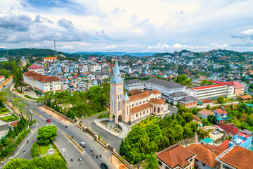 Fototapeta na wymiar Aerial view outside Cathedral chicken on a morning. Old French architecture attracts parishioners to pray for peace at the weekend in Da Lat, Vietnam