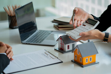 Home Sales and Home Insurance Ideas Real estate agents offer interest rates, discuss the terms of...
