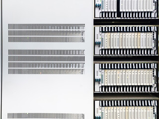 The front of the old technology telecommunication equipment cabinet. The exchange provides a copper telephone line to the house.