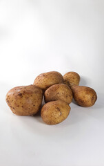 fresh potatoes on a white background