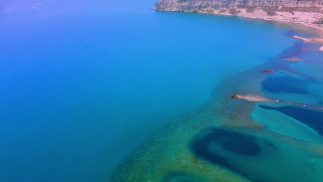 Aerial view of the wild beach of the Mediterranean coast in Cyprus.