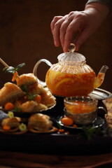 Halva with sea buckthorn tea