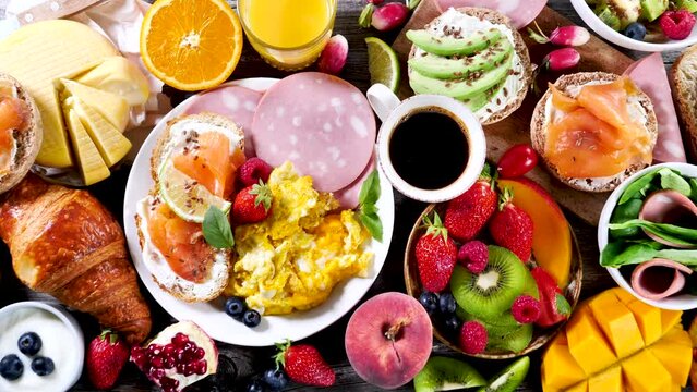 Healthy Brunch Or Breakfast With Scrambled Egg, Fresh Fruits, Toast, Croissant And Coffee Cup