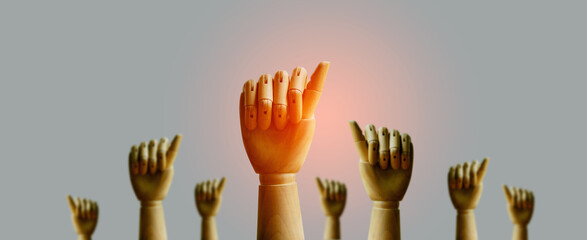 teamwork success Teamwork, raising fists, strong stick hands, victory, success and winning concept. sunlight effect team work concept