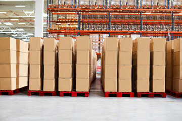 Warehouse with shelves, cardboard packages, boxes on a pallet