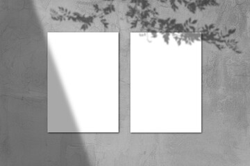 Empty white horizontal rectangular poster mockup with light shadow on gray concrete wall background. - obrazy, fototapety, plakaty