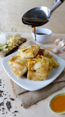 Pempek is a traditional food from Palembang, South Sumatra province, Indonesia. This food is made from basic ingredients of sago and fish