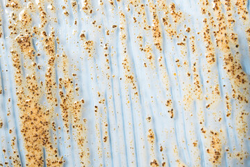 Sample body scrub with coffee on a blue background, top view. Exfoliate and cleanse the skin with natural ingredients.