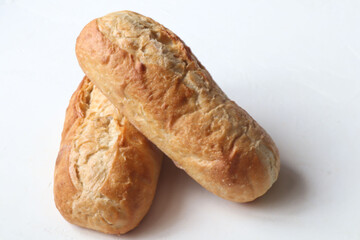 golden loaf in flour on the table,close-up, rich bread Selective focus.bread on a white background