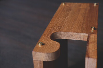 Curved element of hand craft  natural wooden box as shelf furniture on wooden background