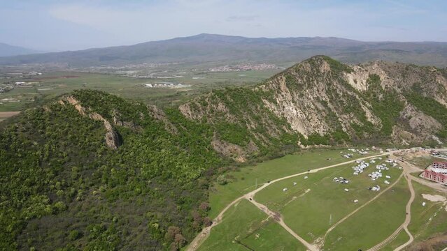 Aerial Spring view of Kozhuh Mountain and Petrich valley, Bulgaria