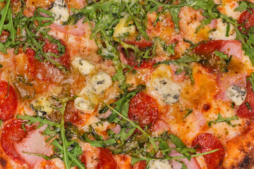 Background of pizza with meat products, top view close-up