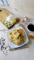 Pempek is a traditional food from Palembang, South Sumatra province, Indonesia. This food is made from basic ingredients of sago and fish