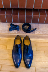 Classic lifestyle wedding details. Close up view of bridal man accessory.