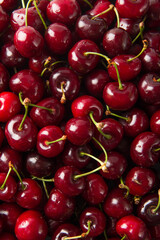 Close up of pile of ripe cherries background