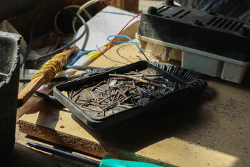 Lots of old tools in the desk at home	
