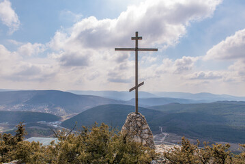 Cross on the mountain above the Chelter-Marmara cave monastery in Crimea