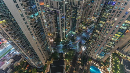 Skyscrapers skyline look down perspective in Dubai Downtown in the evening aerial timelapse. © HyperlapsePro