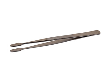 Closeup of steel tweezers for medical surgical or for cosmetic use isolated on white background. Clipping path. Also suitable as stamp tweezers.