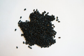 A lot of small dark seeds of black sesame
