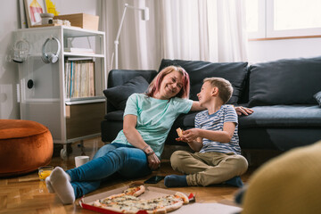 mother and son at home having great time