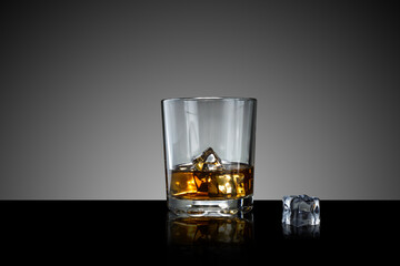 Whiskey on the rocks iin a trendy glass