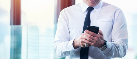 Businessman using smartphone connection application